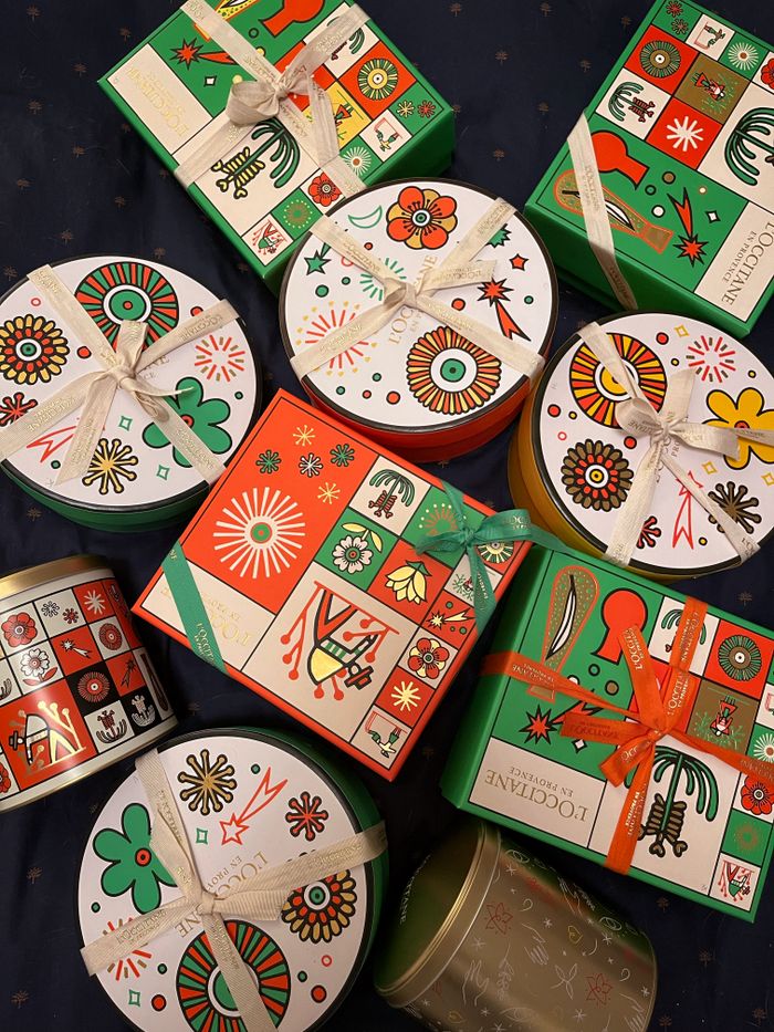An assortment of colorful gift boxes adorned with vibrant patterns, perfect for festive celebrations and special occasions.